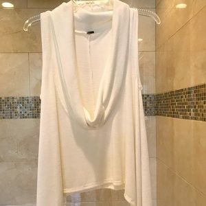 Cowell neck, handkerchief hem, sleeveless sweater